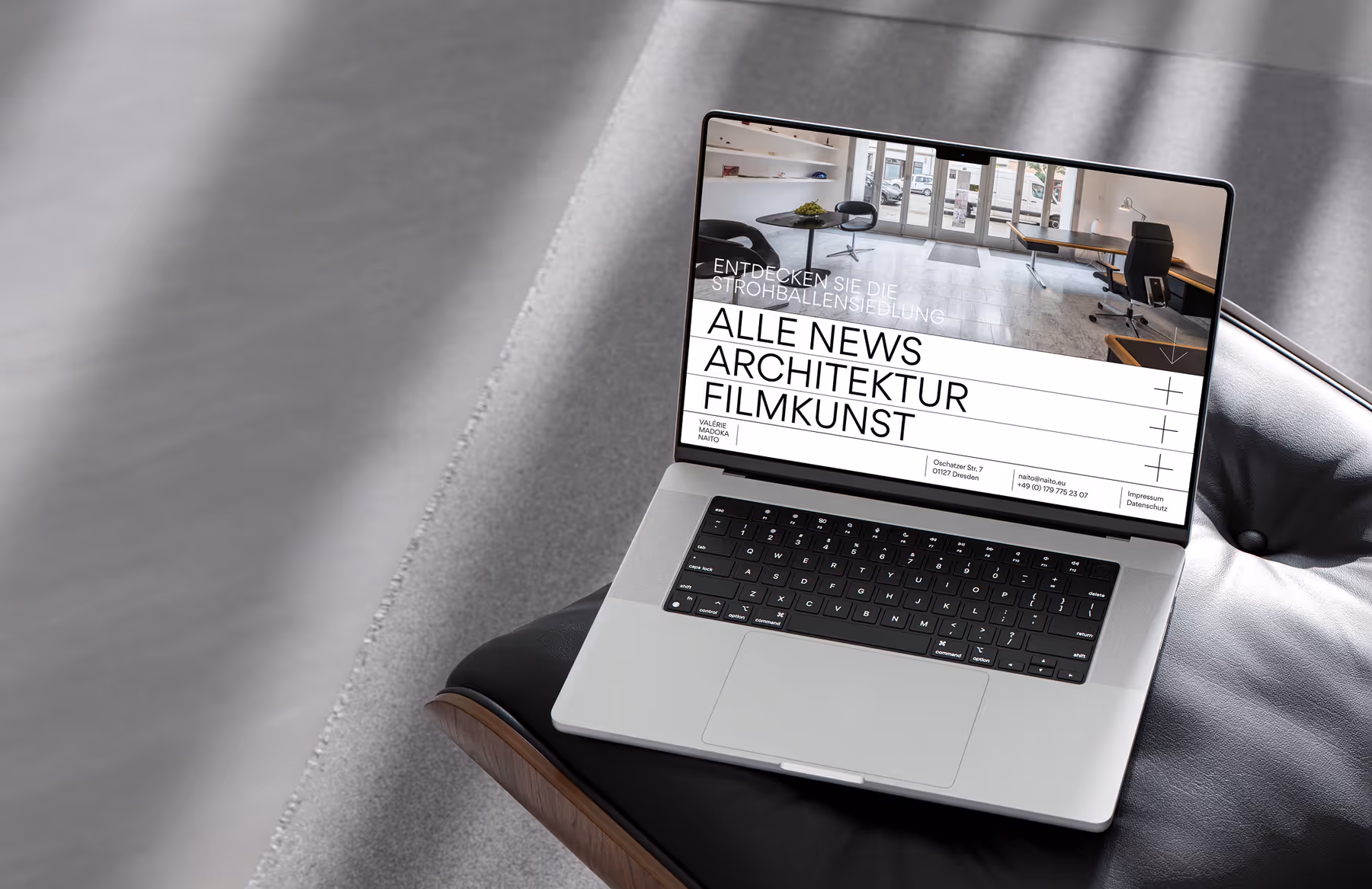 Interior of the Valerie Madoka Naito studio with a large V logo overlay